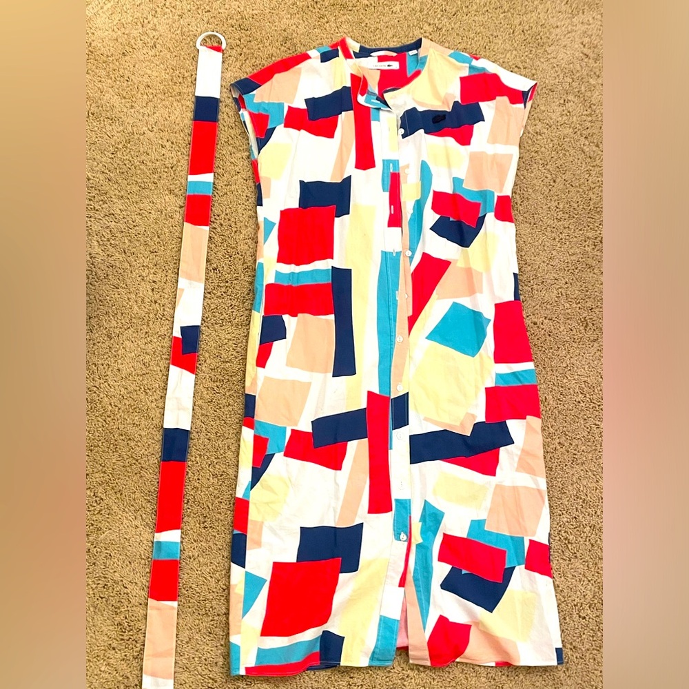 Lacoste abstract, cute, colorful dress with an adjustable belt and pockets!